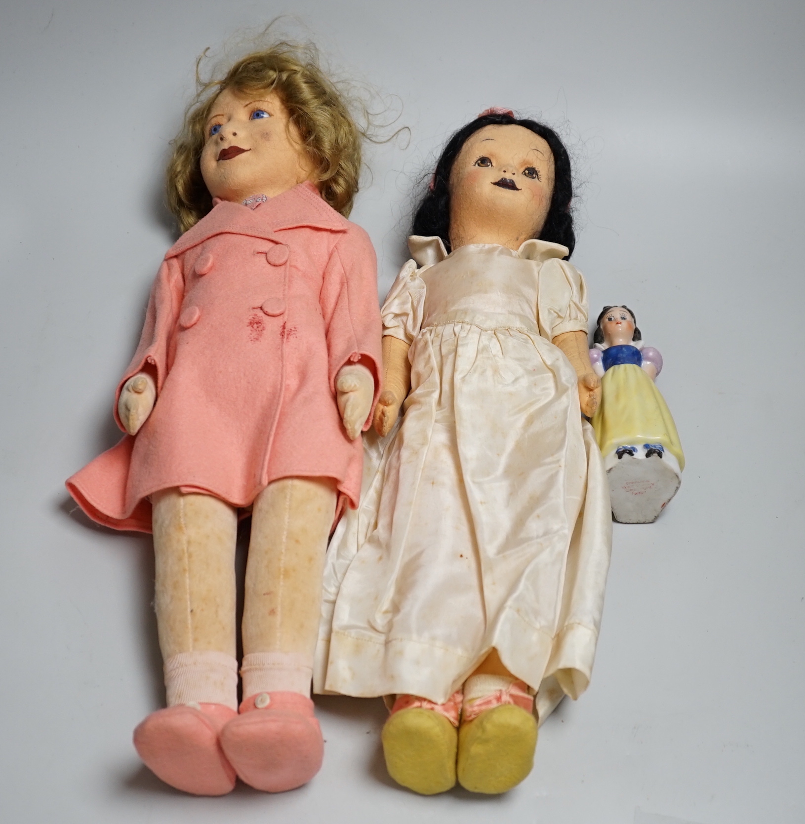 Chad Valley Princess Margaret and Snow White felt dolls and a porcelain figure of Snow White, tallest 45cm high (3)